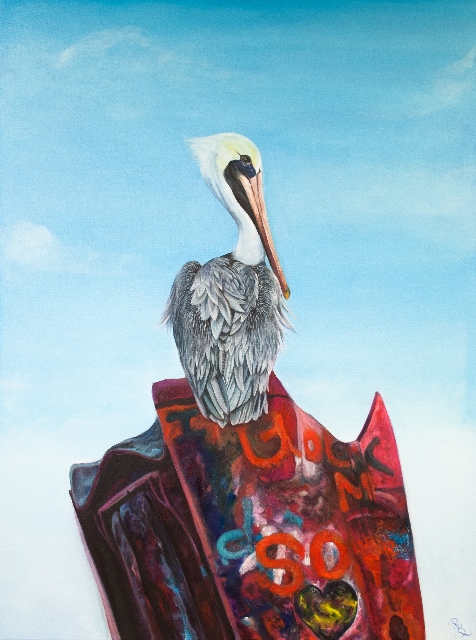 pelican perched on graffiti Cadillac fender blue sky
